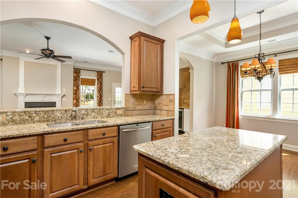 3108 Bridgewick Road Waxhaw, NC 28173 - Photo 12 of 42 a bathroom with a granite countertop sink and a mirror