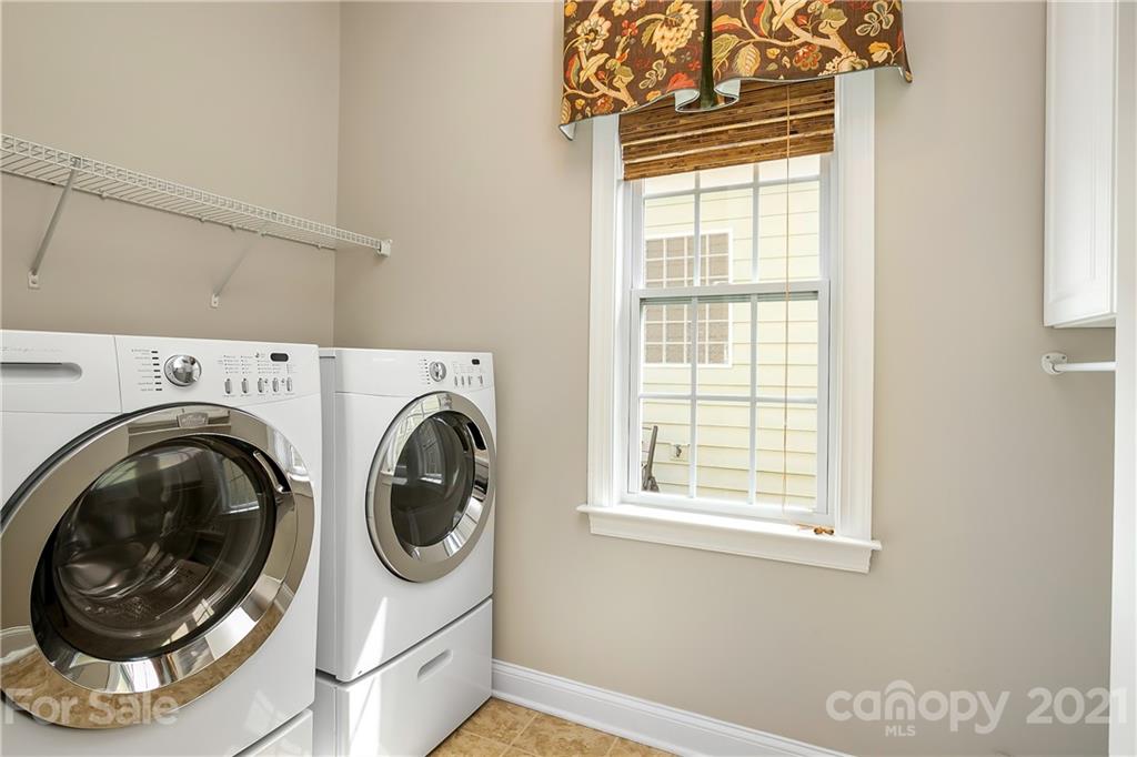 3108 Bridgewick Road Waxhaw, NC 28173 - Photo 25 of 42 a utility room with dryer and washer