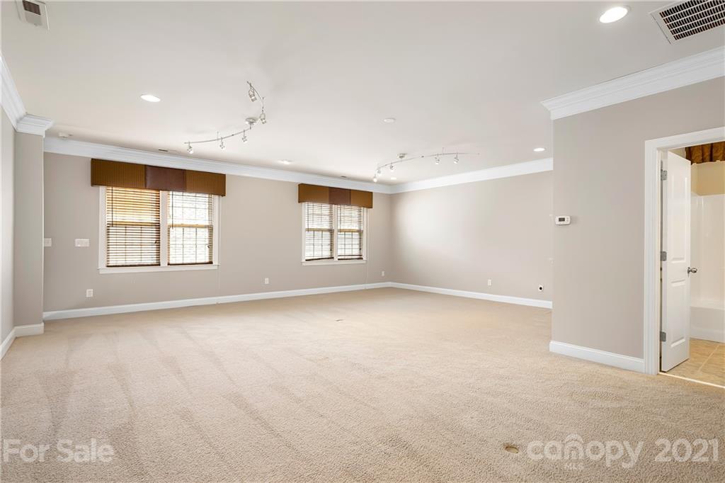 3108 Bridgewick Road Waxhaw, NC 28173 - Photo 27 of 42 an empty room with windows