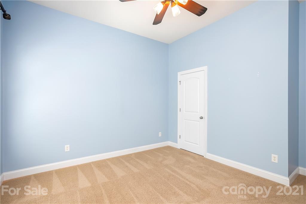 3108 Bridgewick Road Waxhaw, NC 28173 - Photo 30 of 42 an empty room with fan