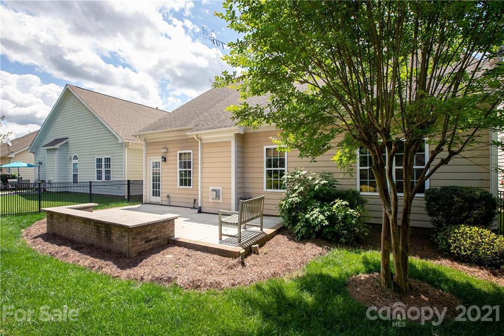 3108 Bridgewick Road Waxhaw, NC 28173 - Photo 4 of 42 a view of a house with backyard and sitting area