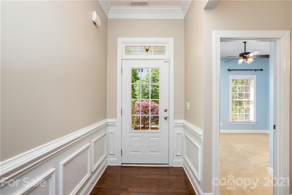 3108 Bridgewick Road Waxhaw, NC 28173 - Photo 35 of 42 a view of an entryway with wooden floor and windows