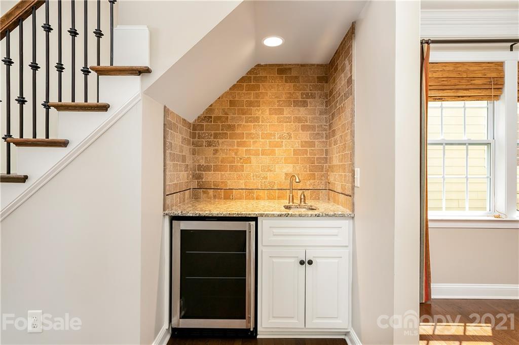 3108 Bridgewick Road Waxhaw, NC 28173 - Photo 9 of 42 a bathroom with a granite countertop sink and a window