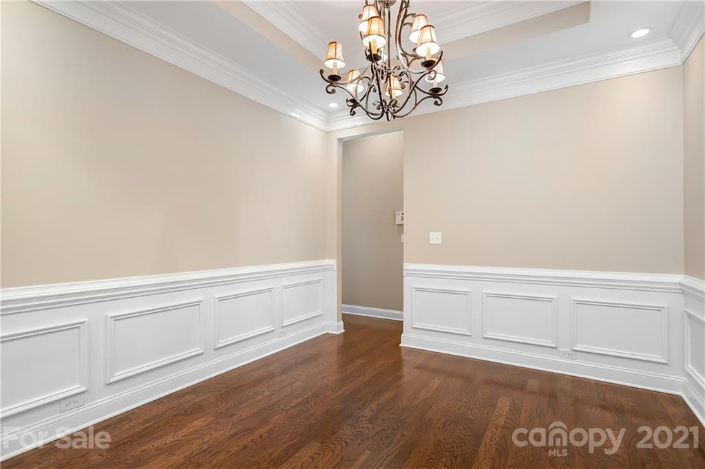 3108 Bridgewick Road Waxhaw, NC 28173 - Photo 10 of 42 a view of an empty room with wooden floor and a window
