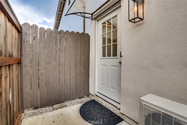a bathroom with a toilet a sink and shower