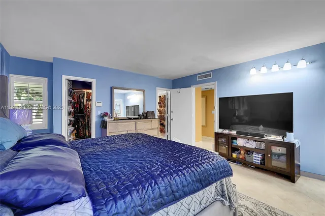 a bathroom with a shower and a toilet