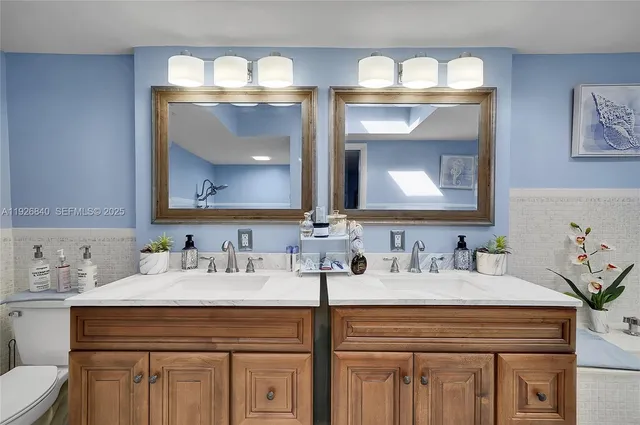 a bathroom with a bathtub and a sink
