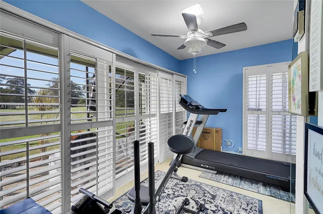 a bathroom with double sink and a mirror