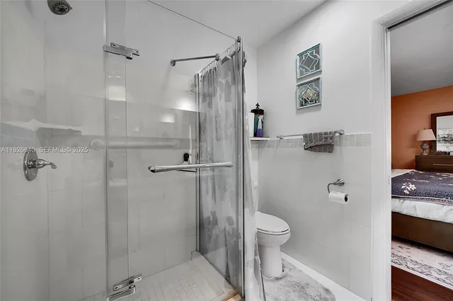 a view of an outdoor dining space with a table and chairs