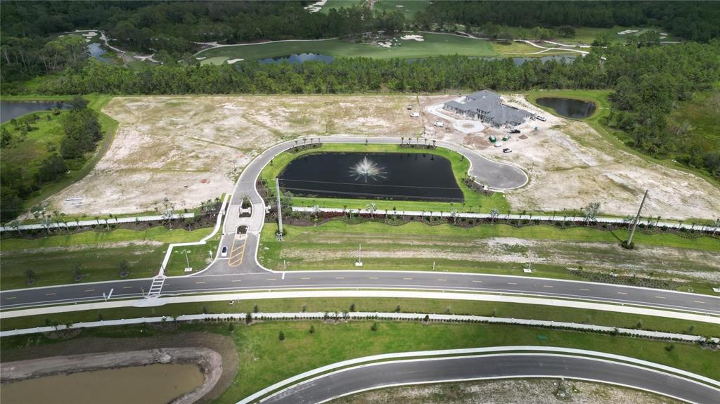18341 Briar Ridge Place Bradenton, FL 34202 - Photo 4 of 5 a view of swimming pool from a lake view