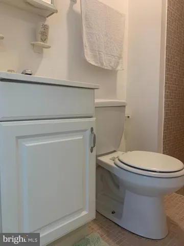 a bathroom with a toilet and a sink