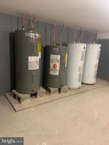 a view of storage and utility room with racks on the wall