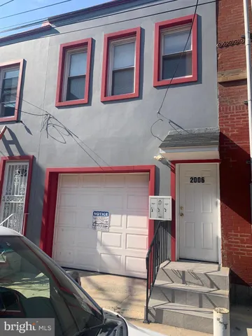 a view of a red door of the house