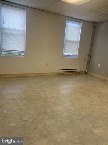 a view of a room with rack on the wall