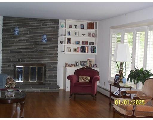 22 Cardinal Road Worcester, MA 01602 - Photo 8 of 31 a living room with furniture and a fireplace