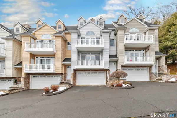 a front view of a building with many windows