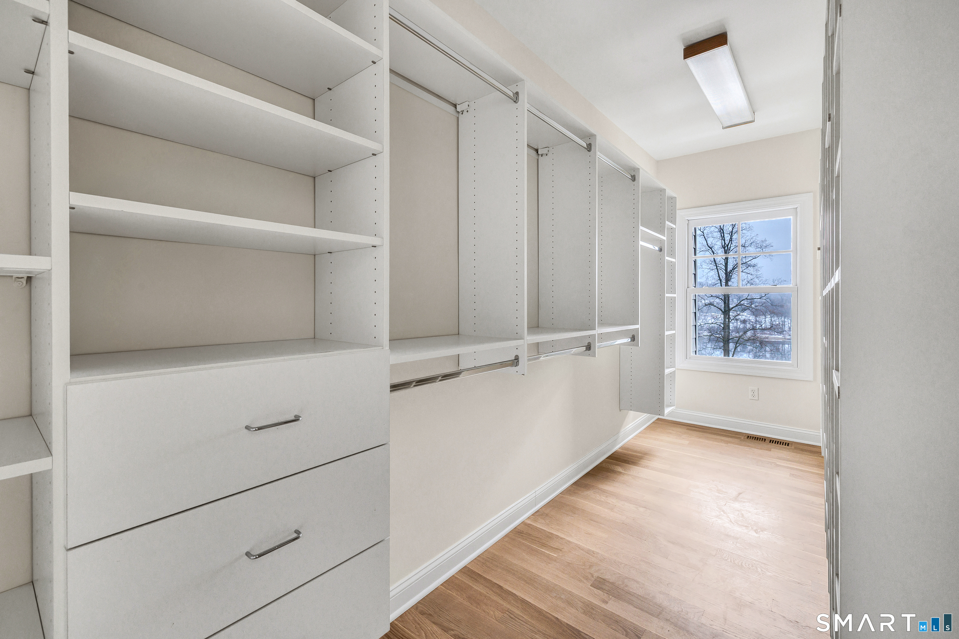 665 River Road, Unit 2 Shelton, CT 06484 - Photo 19 of 33 a view of a walk in closet