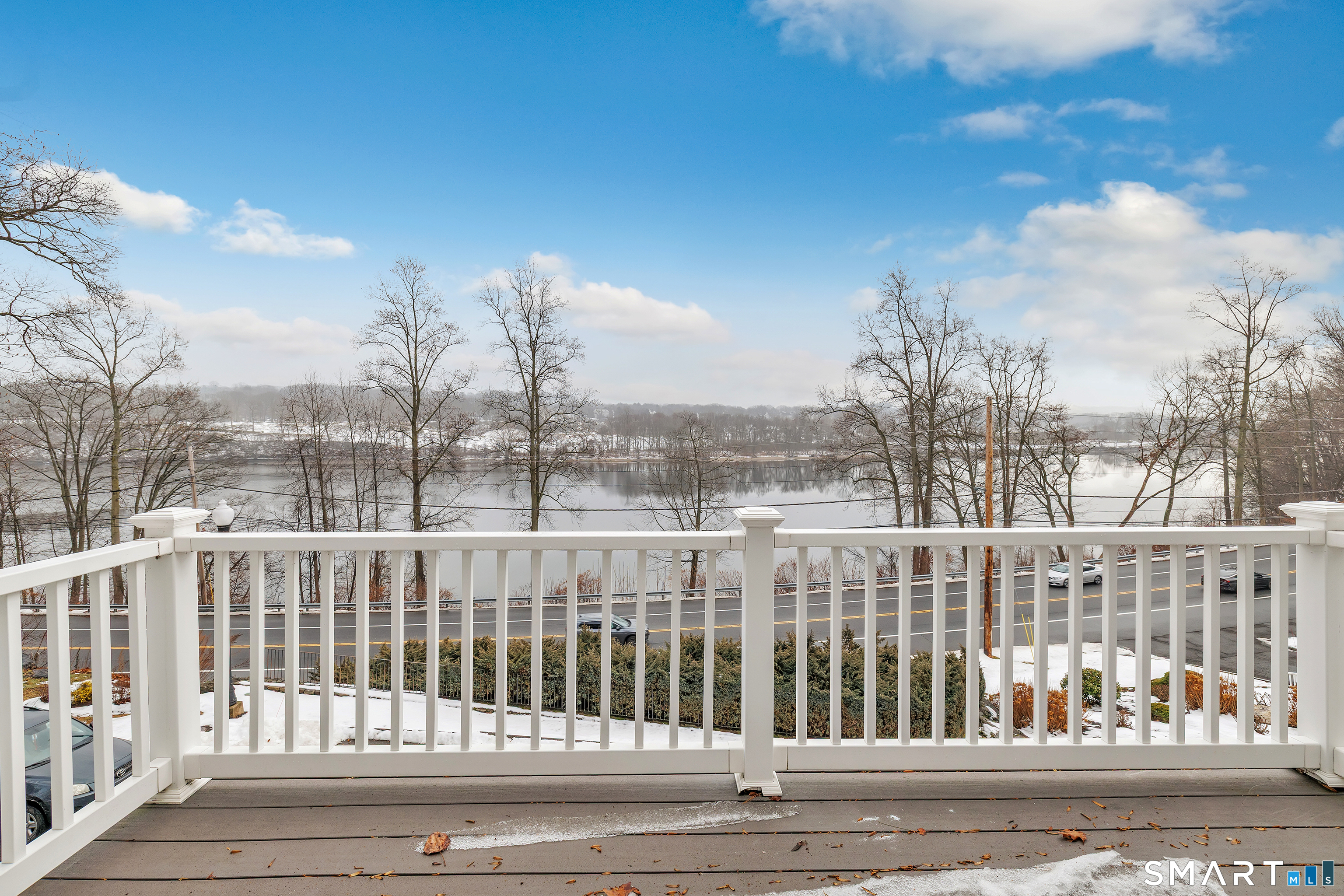 665 River Road, Unit 2 Shelton, CT 06484 - Photo 3 of 33 a view of a city from a balcony