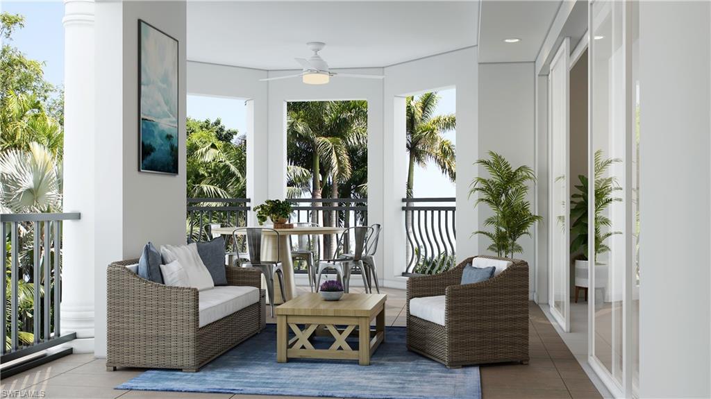 1301 3rd Avenue South Naples, FL 34102 - Photo 14 of 23 a living room with furniture and a potted plant