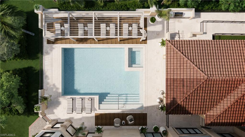 1301 3rd Avenue South Naples, FL 34102 - Photo 21 of 23 a front view of a house with a yard