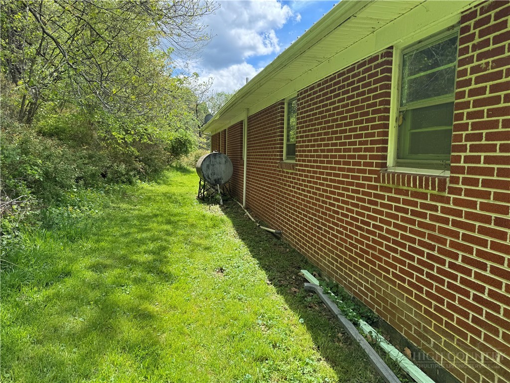 2510 Rich Hill Road Creston, NC 28615 - Photo 36 of 38 a pathway with a house in the background