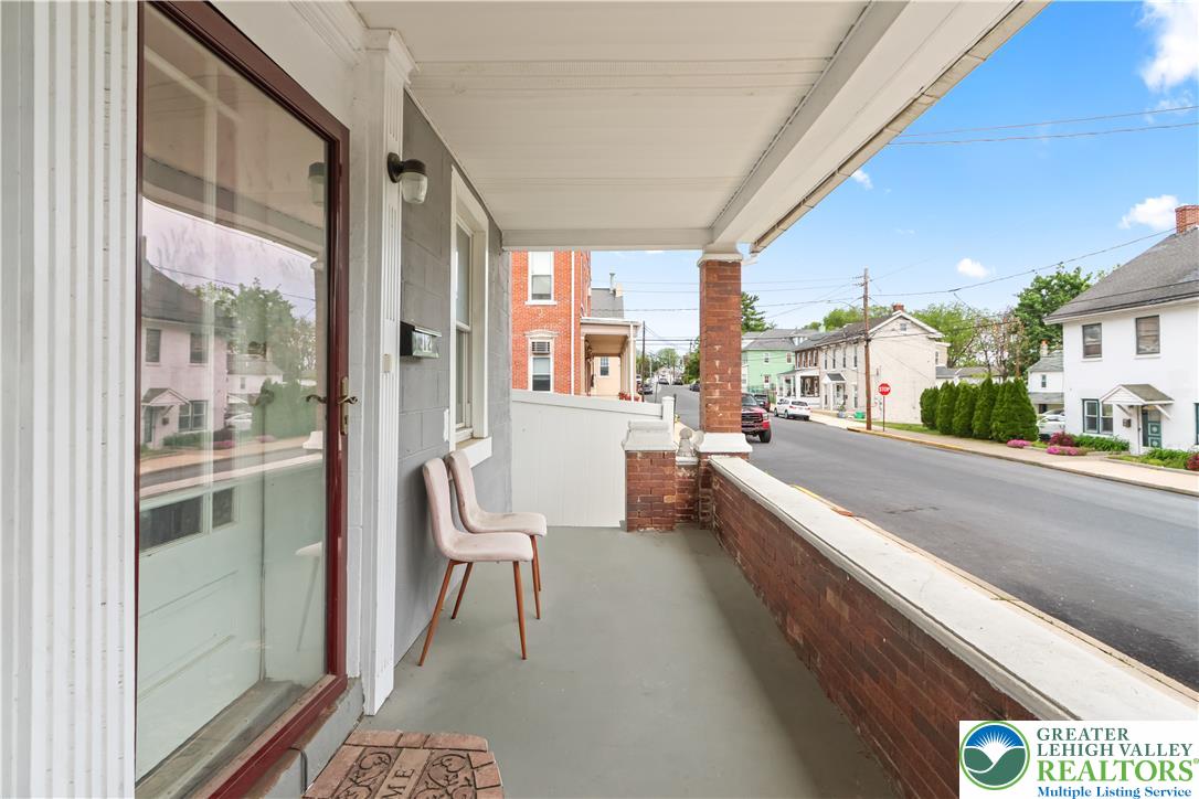 12 South Front Street Coplay, PA 18037 - Photo 3 of 41 This inviting porch welcomes you home, offering a perfect spot to relax and enjoy the neighborhood views.