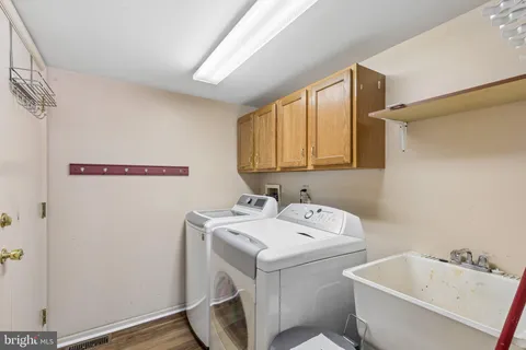 a room with lots of chairs and a table