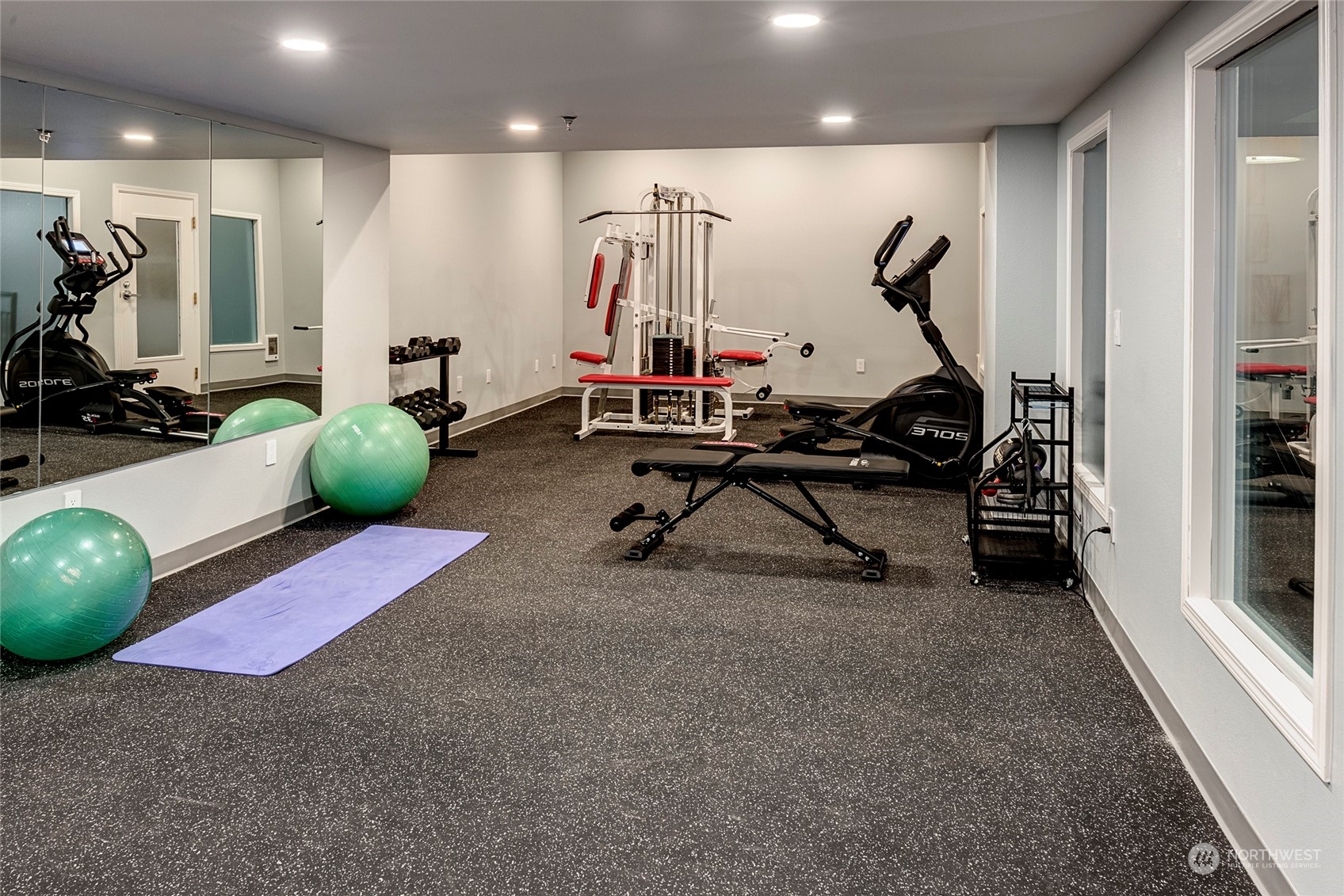3028 Western Avenue, Unit 408 Seattle, WA 98121 - Photo 14 of 40 a view of a room with gym equipment