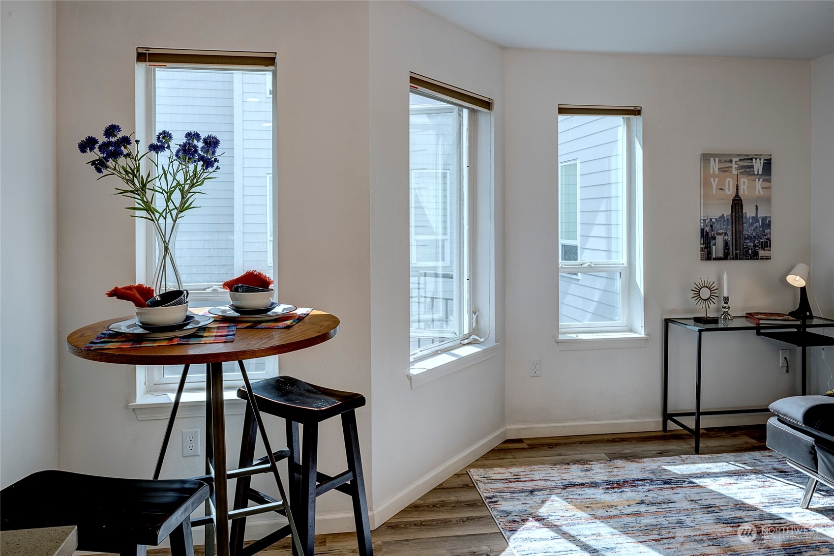 3028 Western Avenue, Unit 408 Seattle, WA 98121 - Photo 3 of 40 a view of a workspace with furniture and a window