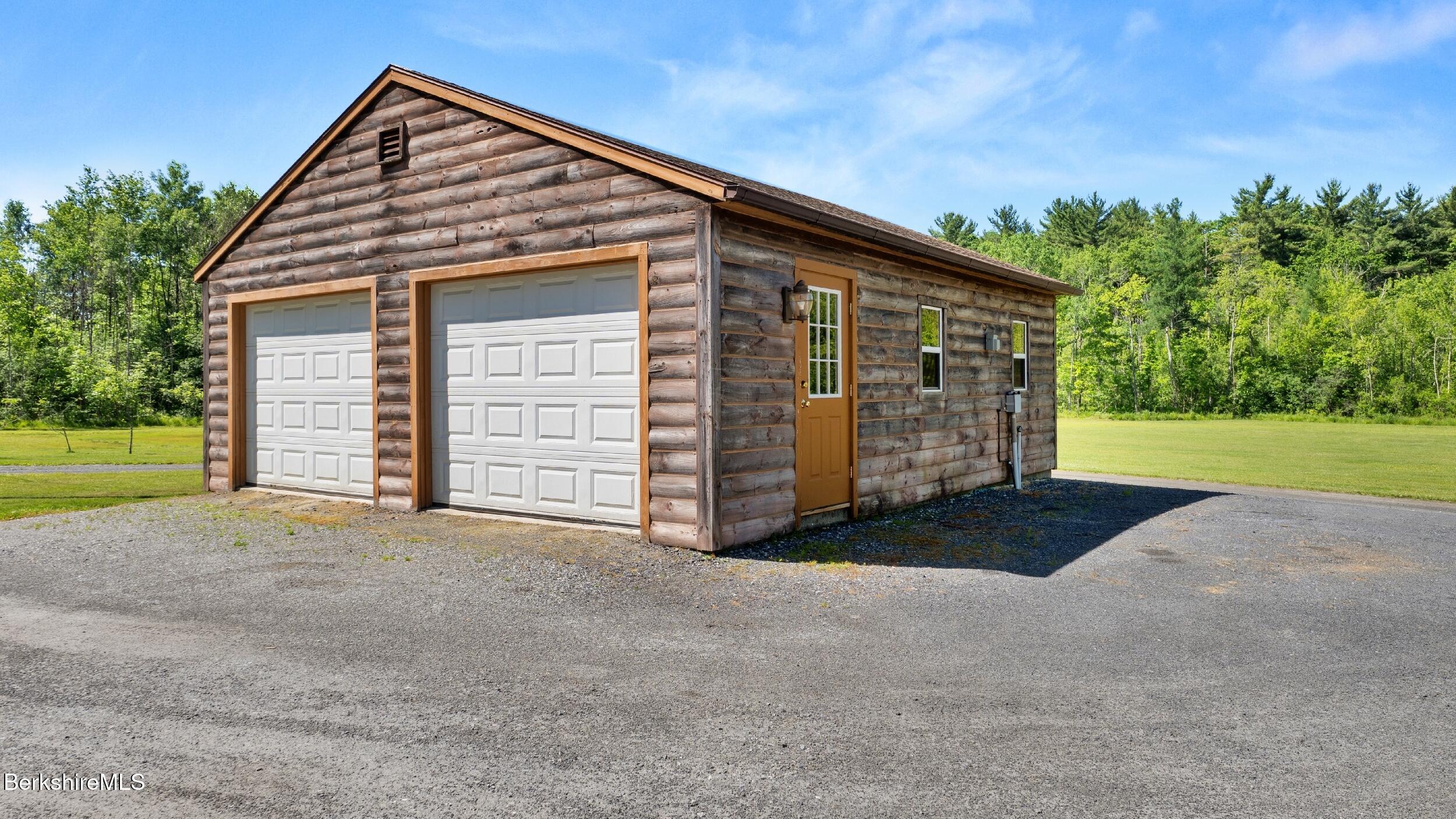 134 Hurlburt Road Great Barrington, MA 01230 - Photo 46 of 50 a view of a house with a yard