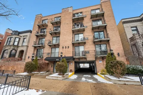 a view of a building with a street