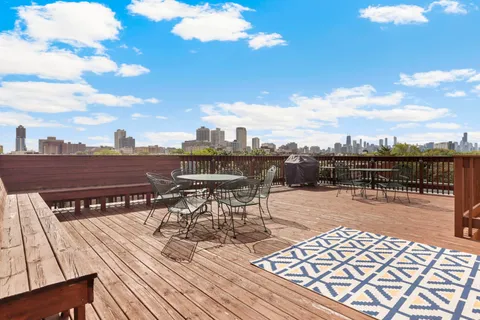 a view of a terrace with seating area