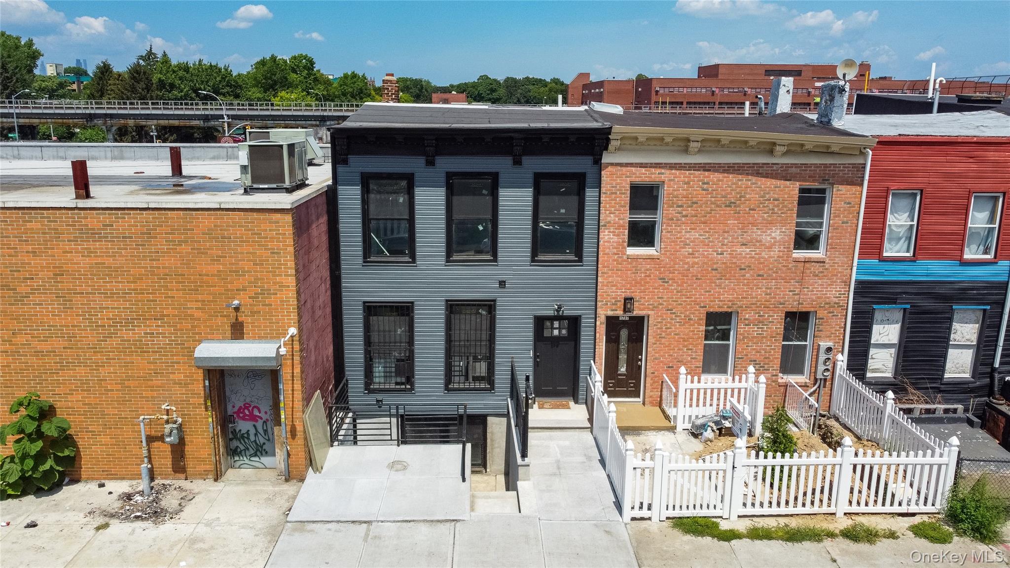 View of front of house with brick siding
