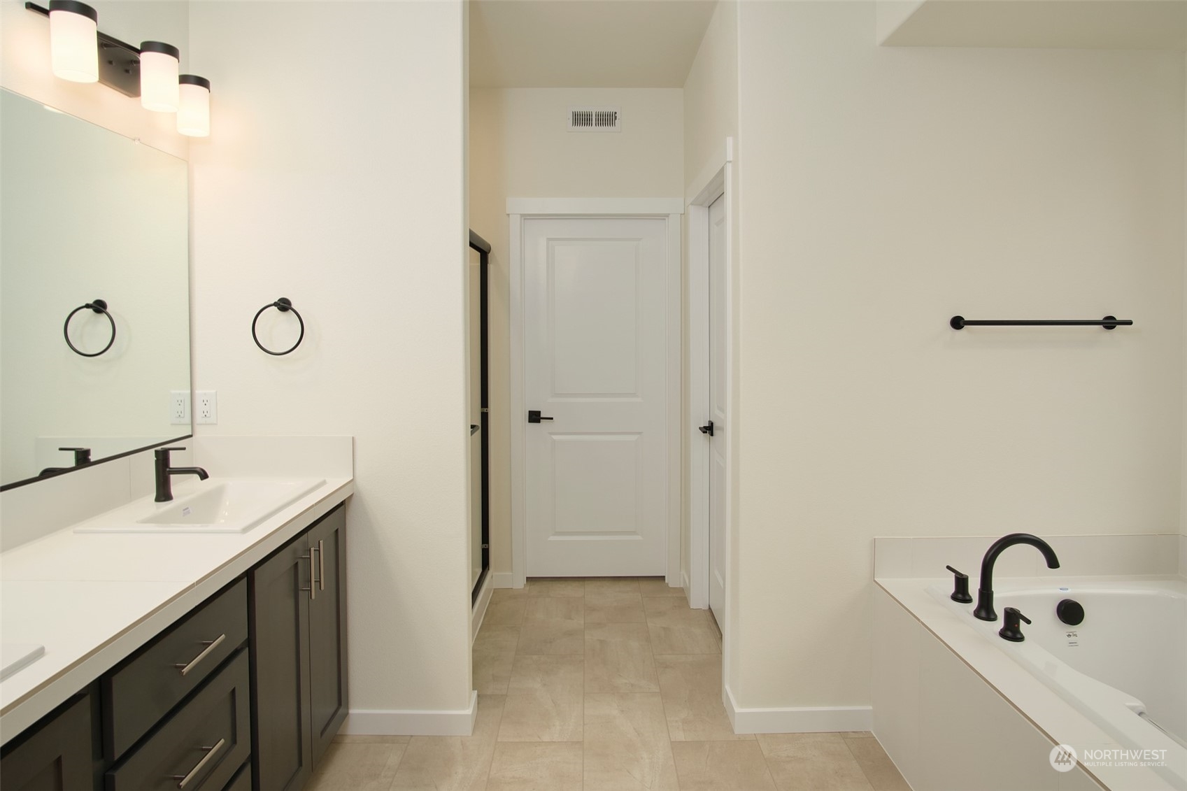 1070 Rw Fletcher Street Winlock, WA 98596 - Photo 15 of 21 a bathroom with a sink and mirror