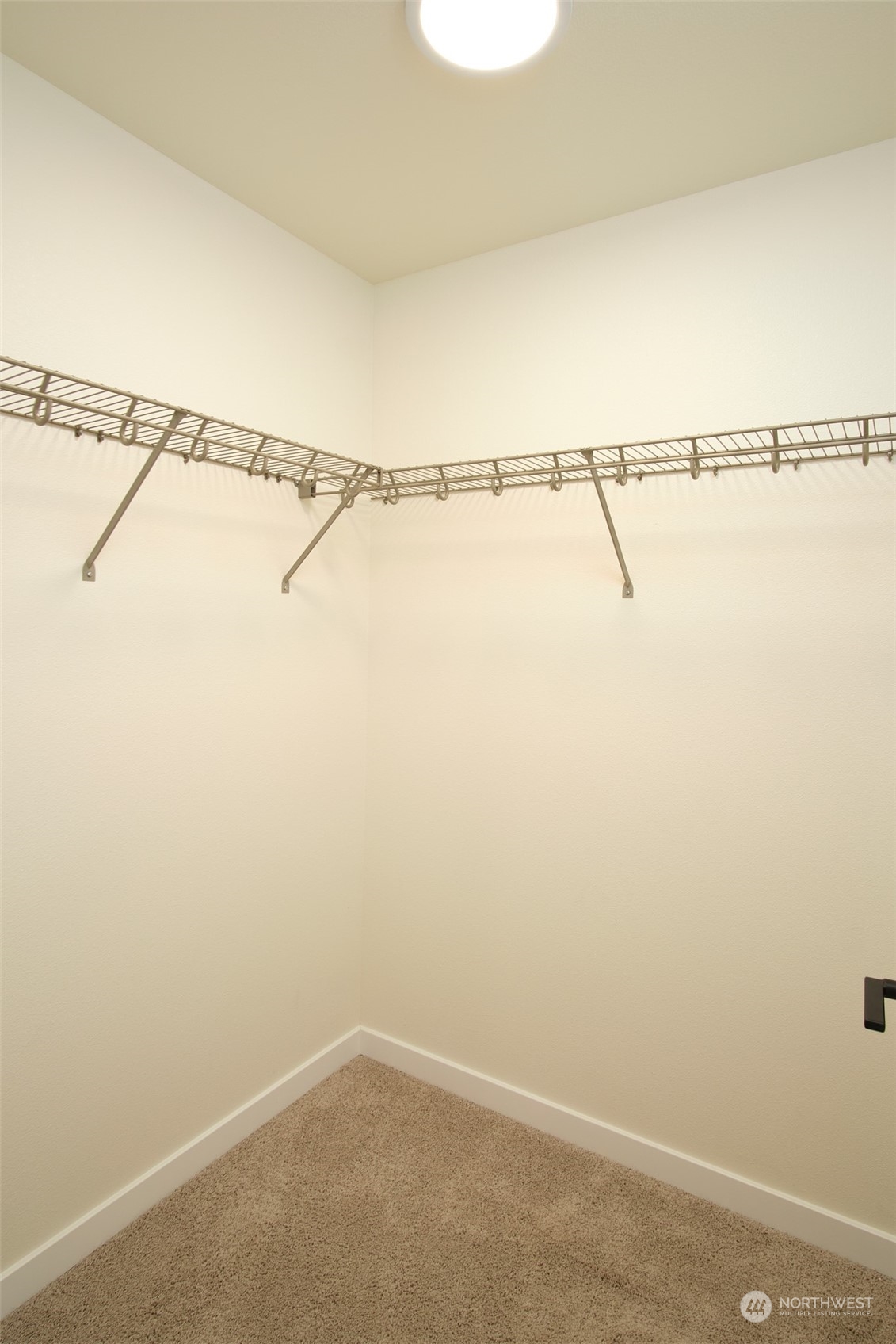 1070 Rw Fletcher Street Winlock, WA 98596 - Photo 18 of 21 a view of a room with racks on the wall