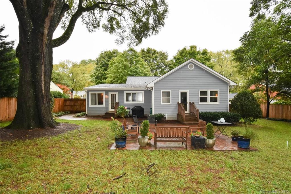 1017 Sedgefield Road Charlotte, NC 28209 - Photo 22 of 24 a view of a house with backyard porch and sitting area