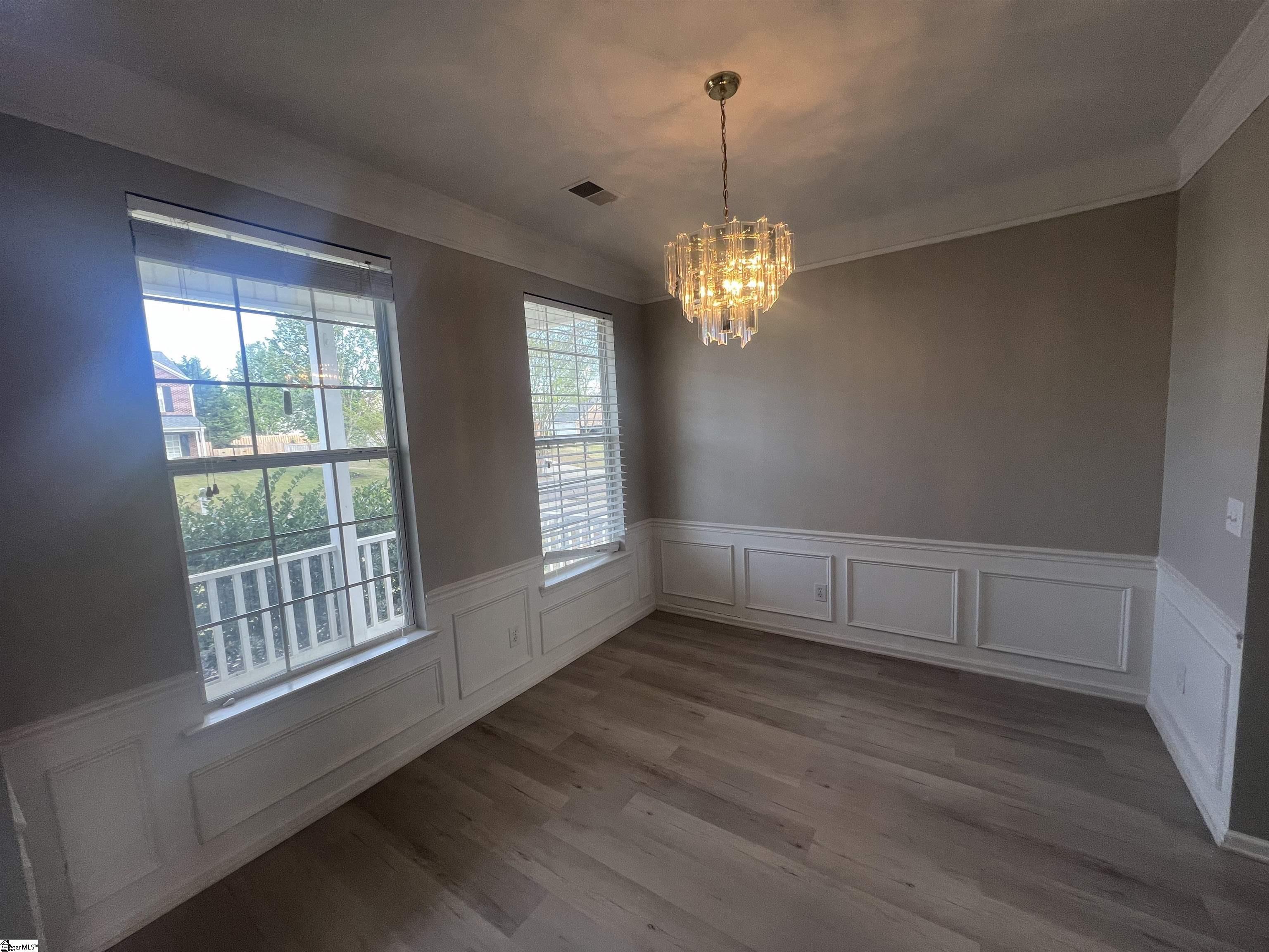 522 Peach Grove Place Mauldin, SC 29662 - Photo 2 of 36 As you enter the home you are welcome with this formal dining room.