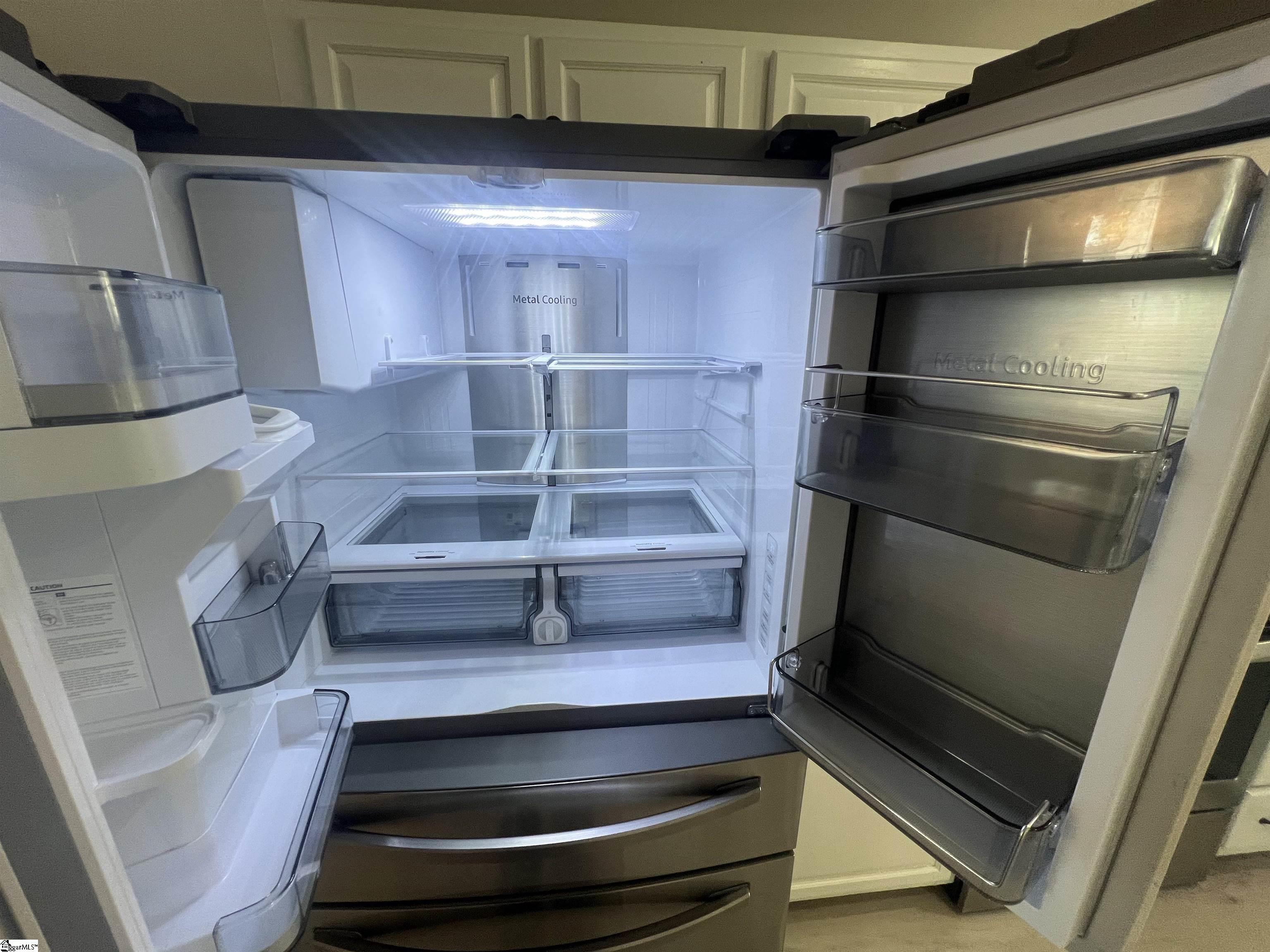 522 Peach Grove Place Mauldin, SC 29662 - Photo 6 of 36 Double French Door Stainless Steel Fridge.