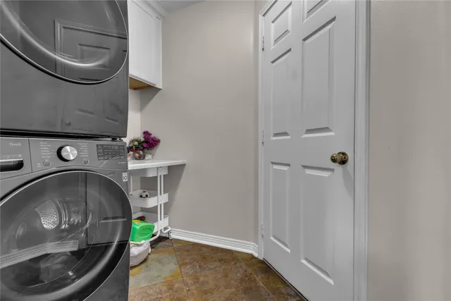 a view of a backyard with potted plants