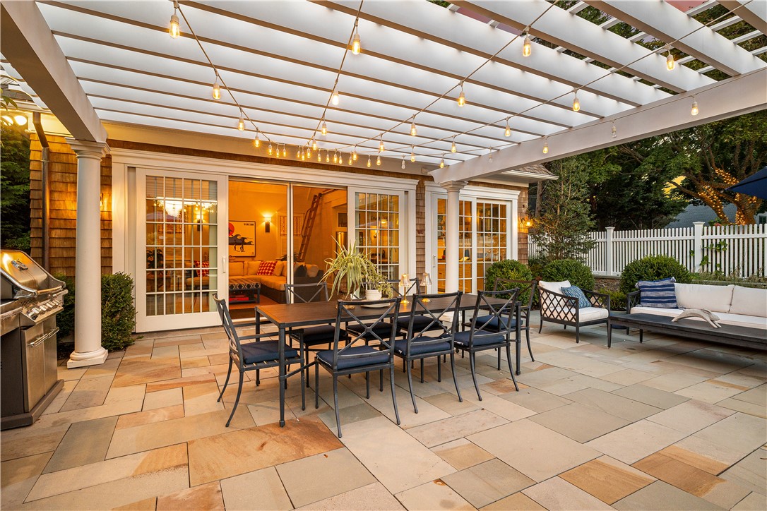 100 Longfellow Road Jamestown, RI 02835 - Photo 17 of 50 Lovely patio for outdoor dining (twilight photo)