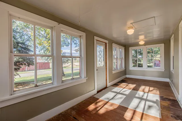 a view of hallway with windows