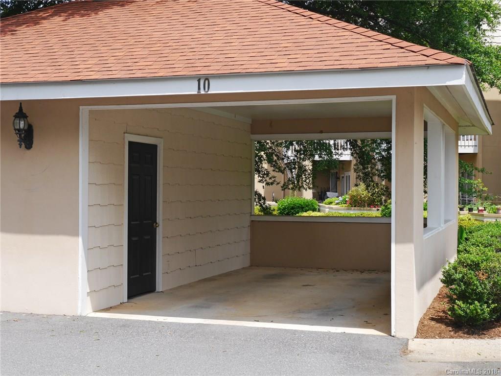 17925 Kings Point Drive, Unit F Cornelius, NC 28031 - Photo 27 of 36 a front view of house with a garden