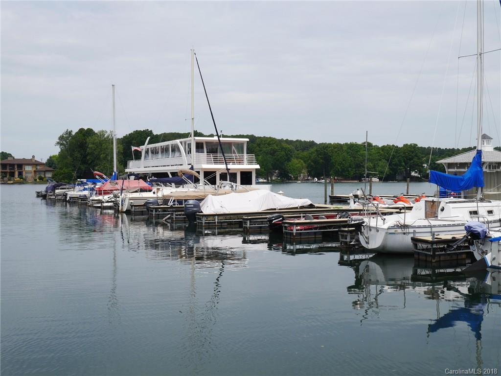 17925 Kings Point Drive, Unit F Cornelius, NC 28031 - Photo 30 of 36 a view of swimming pool with outdoor seating and plants