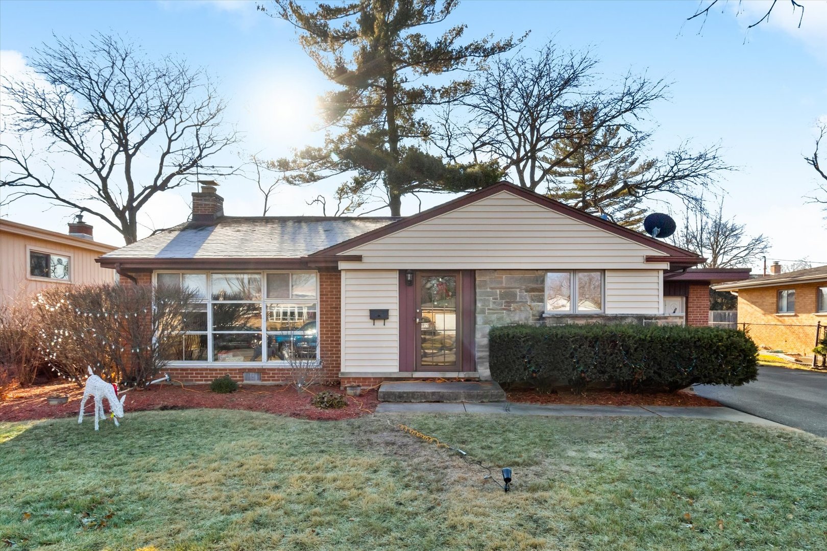 356 East Church Street Elmhurst, IL 60126 - Photo 1 of 16 a front view of a house with a garden