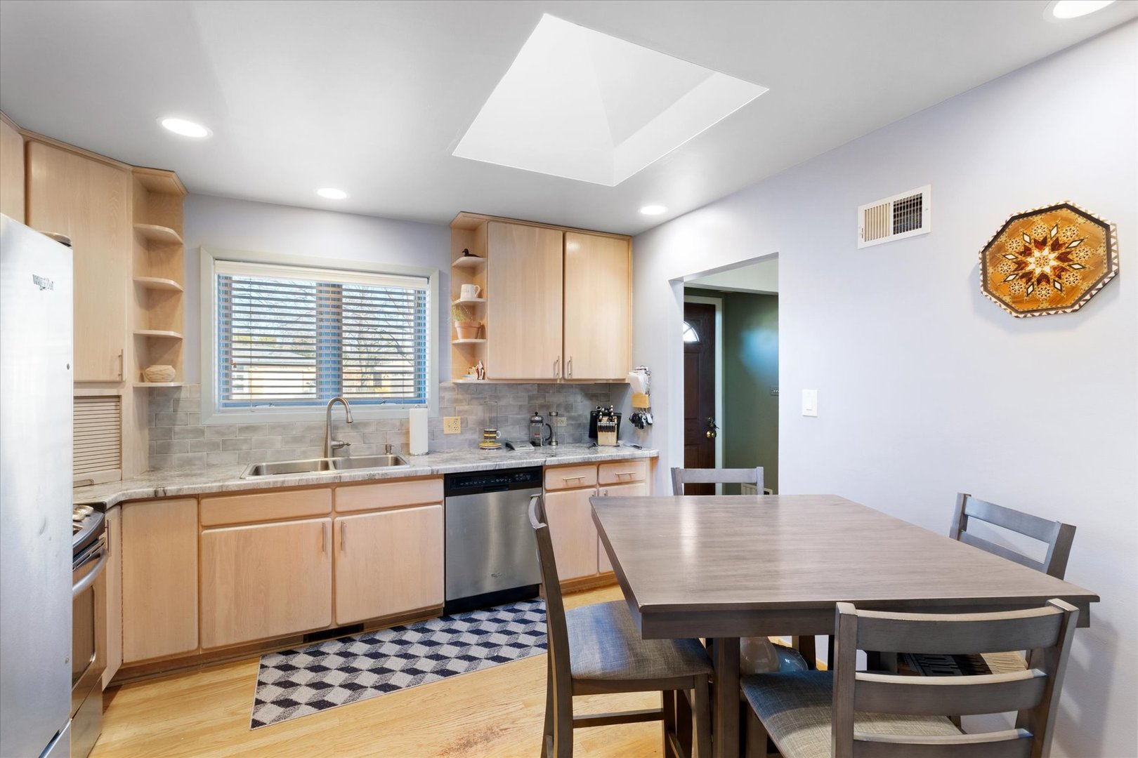 356 East Church Street Elmhurst, IL 60126 - Photo 5 of 16 a view of a kitchen area with furniture and window