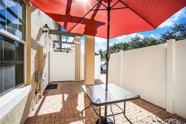 a backyard of a house with seating space