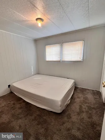 a bathroom with a toilet a sink and bathtub