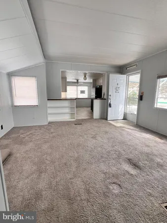 a kitchen with sink cabinets and window