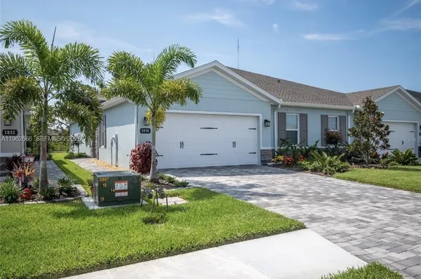 a front view of house with yard