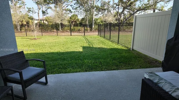 a view of a backyard with a garden
